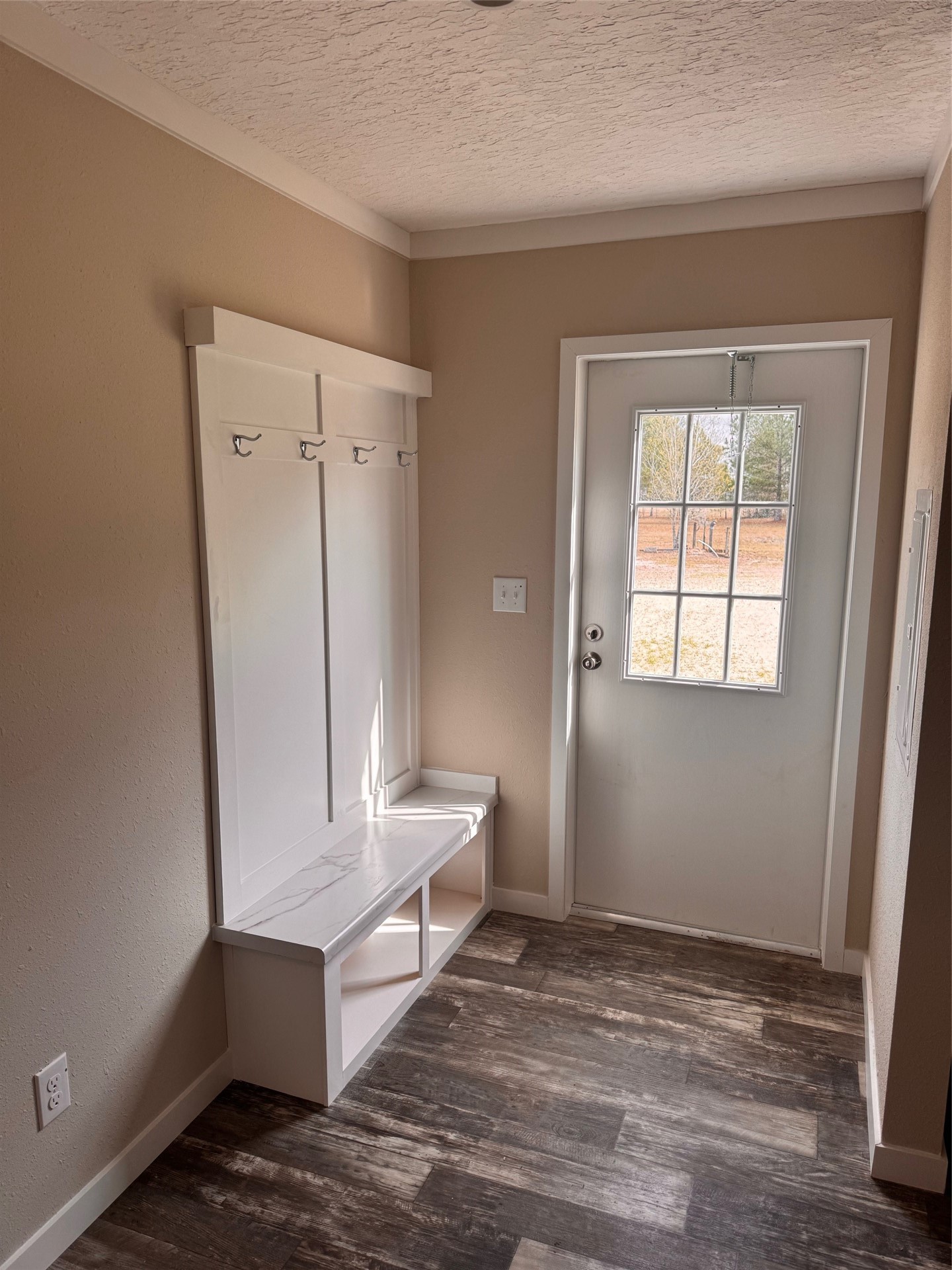 273535 Murrhee Road Hilliard, FL 32046 - Photo 18 of 25 a view of an empty room with wooden floor and a window