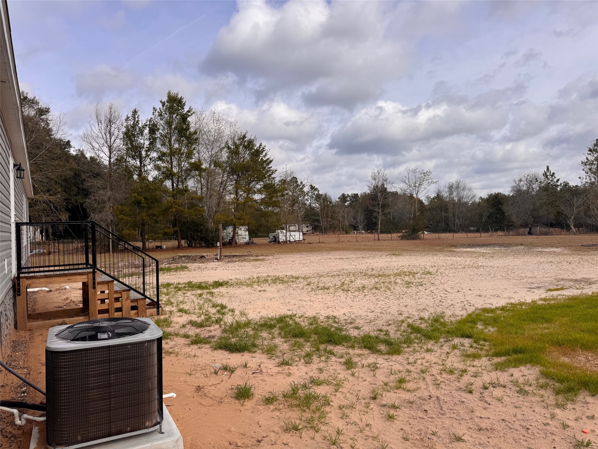273535 Murrhee Road Hilliard, FL 32046 - Photo 4 of 25 a view of a yard with wooden fence