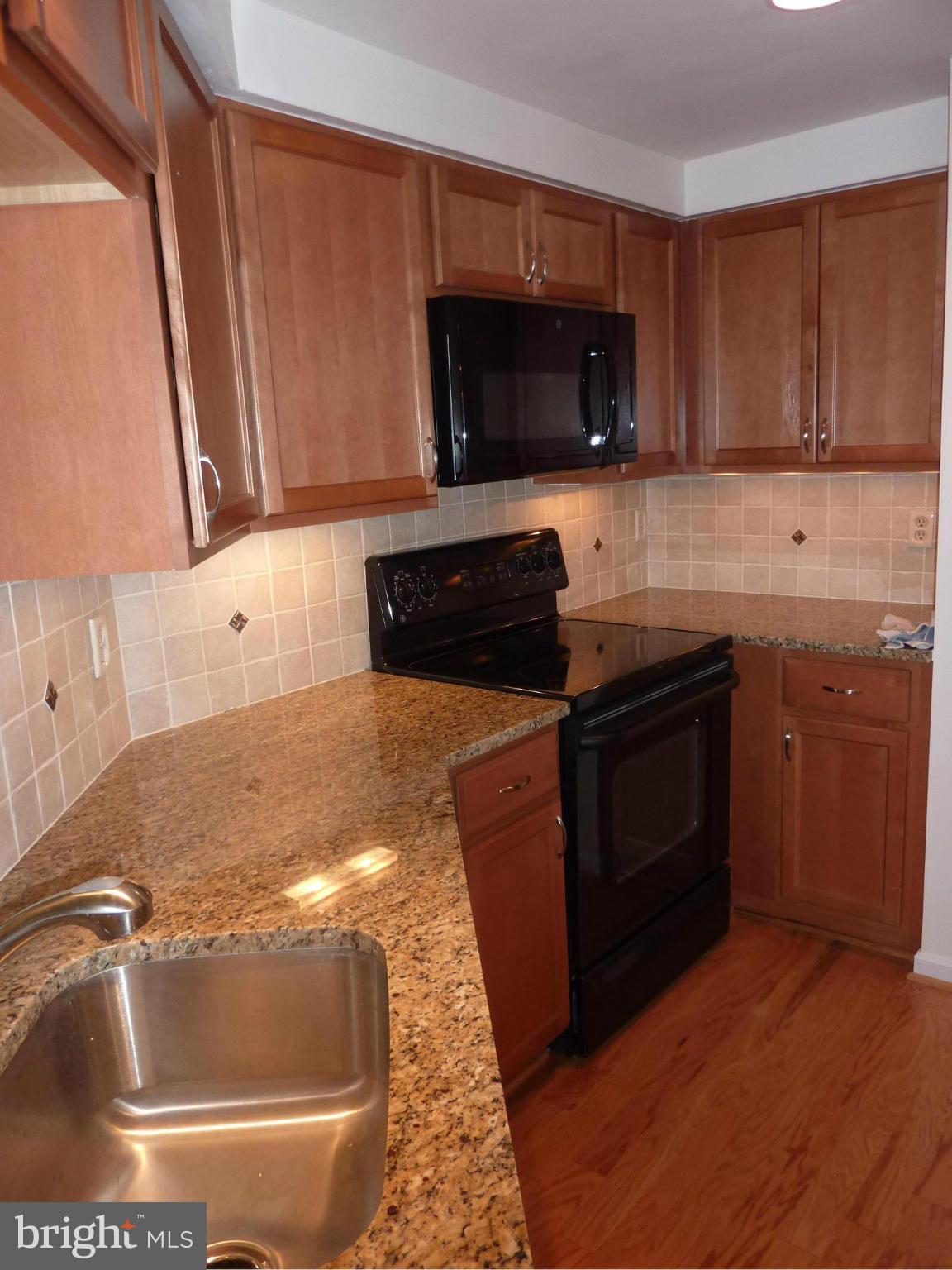 11300 Harbor Court, Unit 113 Reston, VA 20191 - Photo 13 of 26 Note granite counter
