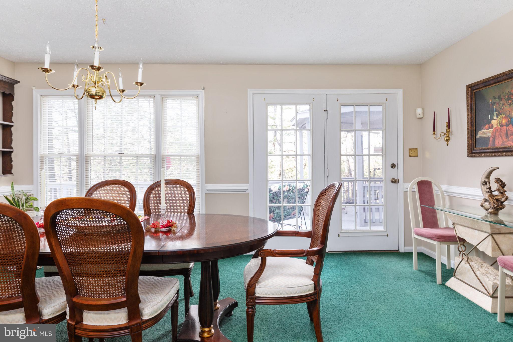 317 Anderson Road Basye, VA 22842 - Photo 13 of 51 a view of a dining room with furniture window and outside view