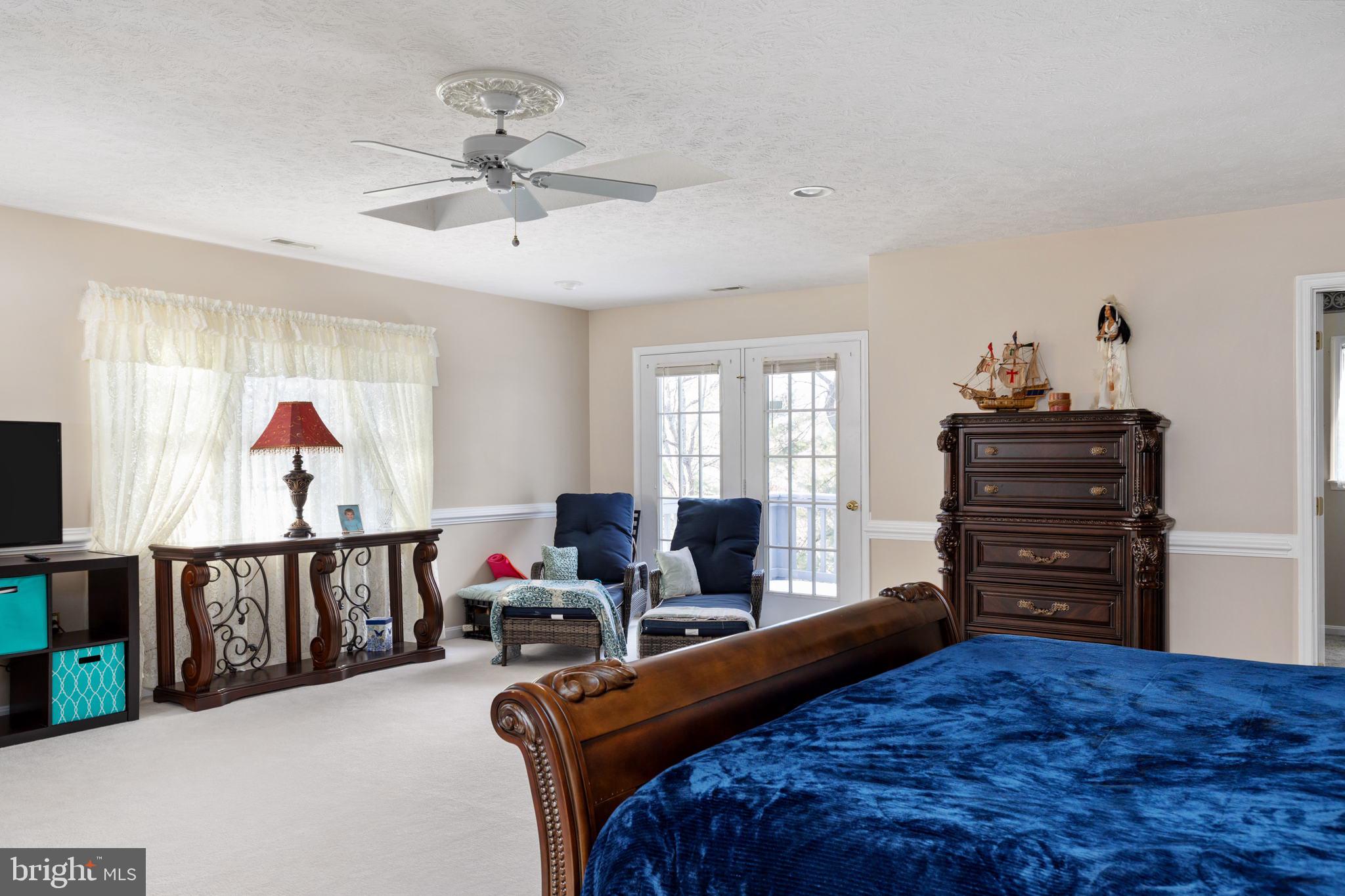317 Anderson Road Basye, VA 22842 - Photo 22 of 51 a bedroom with a bed and furniture