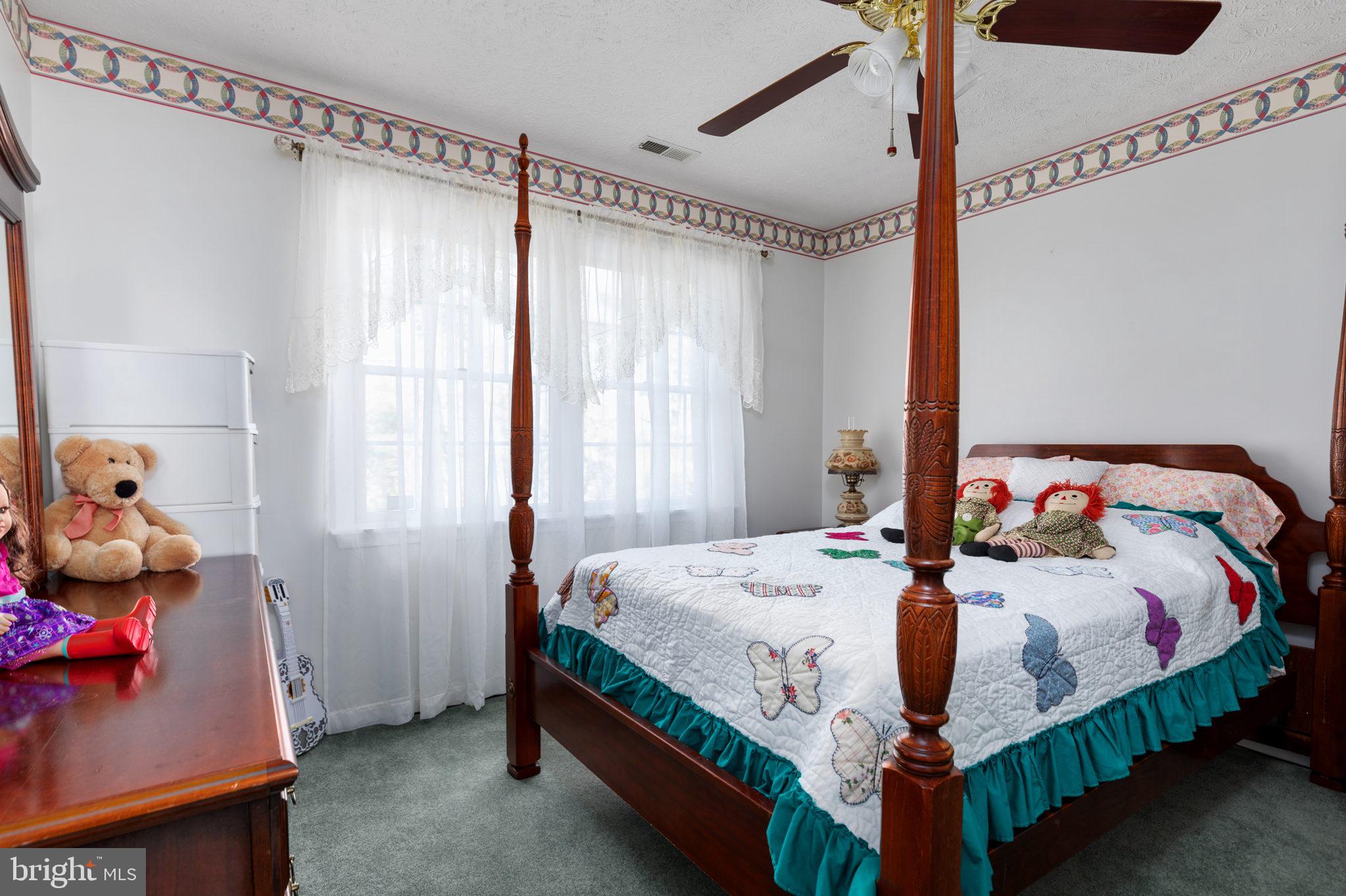 317 Anderson Road Basye, VA 22842 - Photo 25 of 51 a bedroom with a bed and window