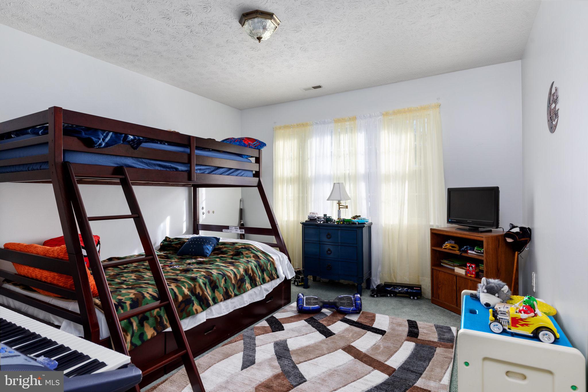 317 Anderson Road Basye, VA 22842 - Photo 26 of 51 a bedroom with furniture and a window
