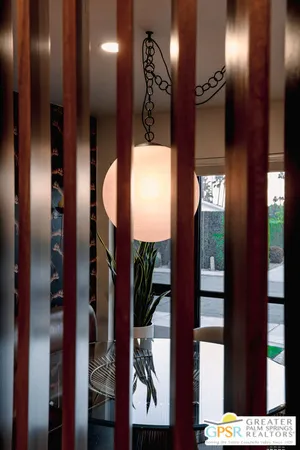 a bed room with furniture and a window