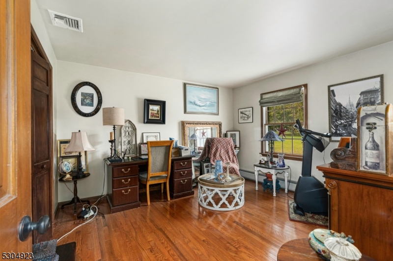 64 Mattison Road Branchville, NJ 07826 - Photo 19 of 40 a living room with furniture and wooden floor