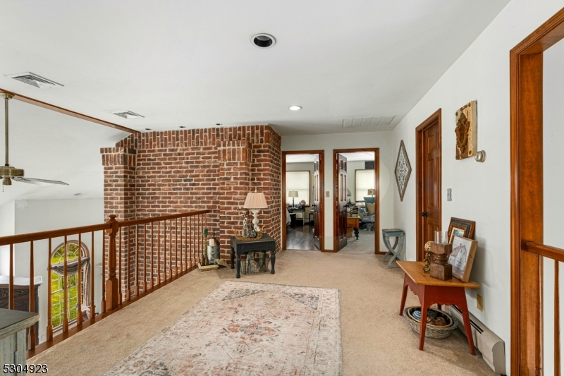 64 Mattison Road Branchville, NJ 07826 - Photo 20 of 40 a view of living room with furniture and floor to ceiling window