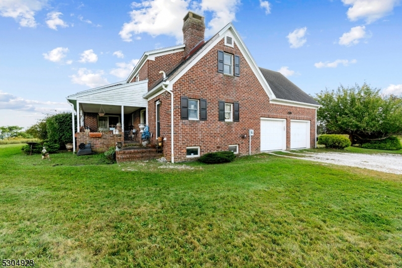 64 Mattison Road Branchville, NJ 07826 - Photo 39 of 40 a front view of house with yard and green space