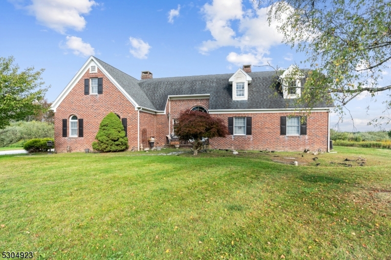 64 Mattison Road Branchville, NJ 07826 - Photo 40 of 40 a front view of a house with a garden