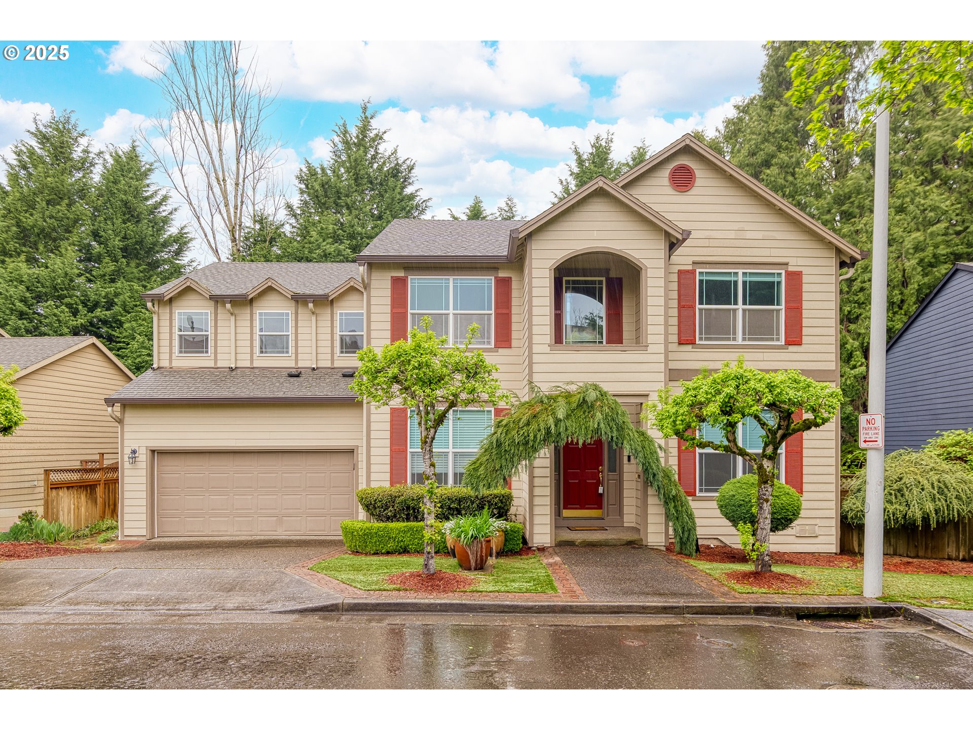 1971 Southwest 19th Terrace Gresham, OR 97080 - Photo 1 of 31 a front view of a house with a yard and potted plants