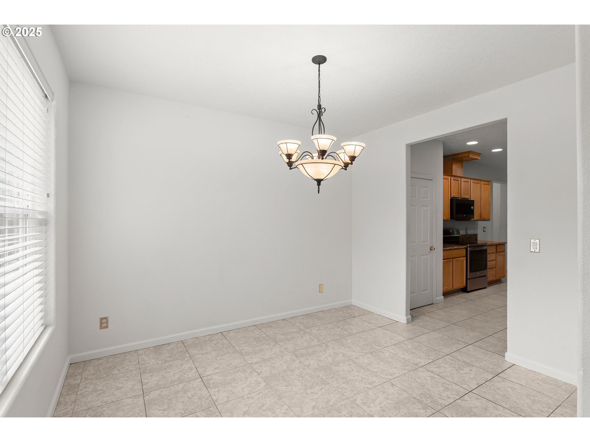 1971 Southwest 19th Terrace Gresham, OR 97080 - Photo 11 of 31 a view of an empty room with a window
