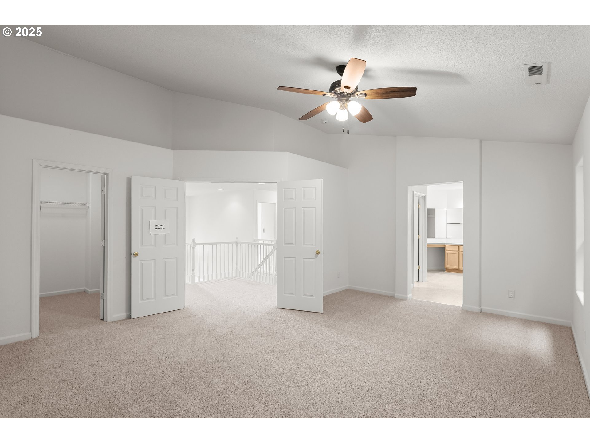 1971 Southwest 19th Terrace Gresham, OR 97080 - Photo 17 of 31 a view of an empty room with a ceiling fan