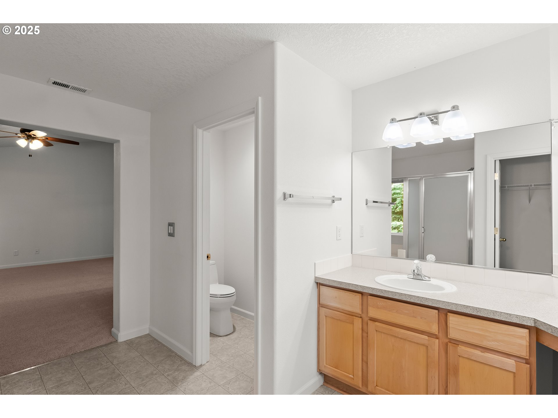 1971 Southwest 19th Terrace Gresham, OR 97080 - Photo 19 of 31 a bathroom with a double vanity sink and a mirror