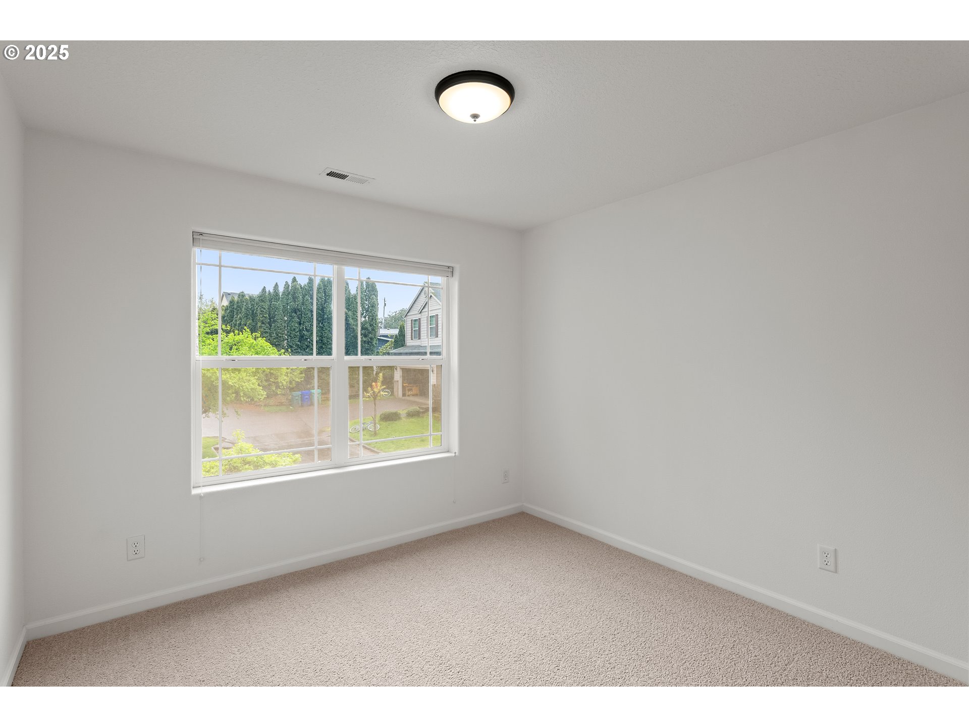 1971 Southwest 19th Terrace Gresham, OR 97080 - Photo 21 of 31 a view of an empty room with a window