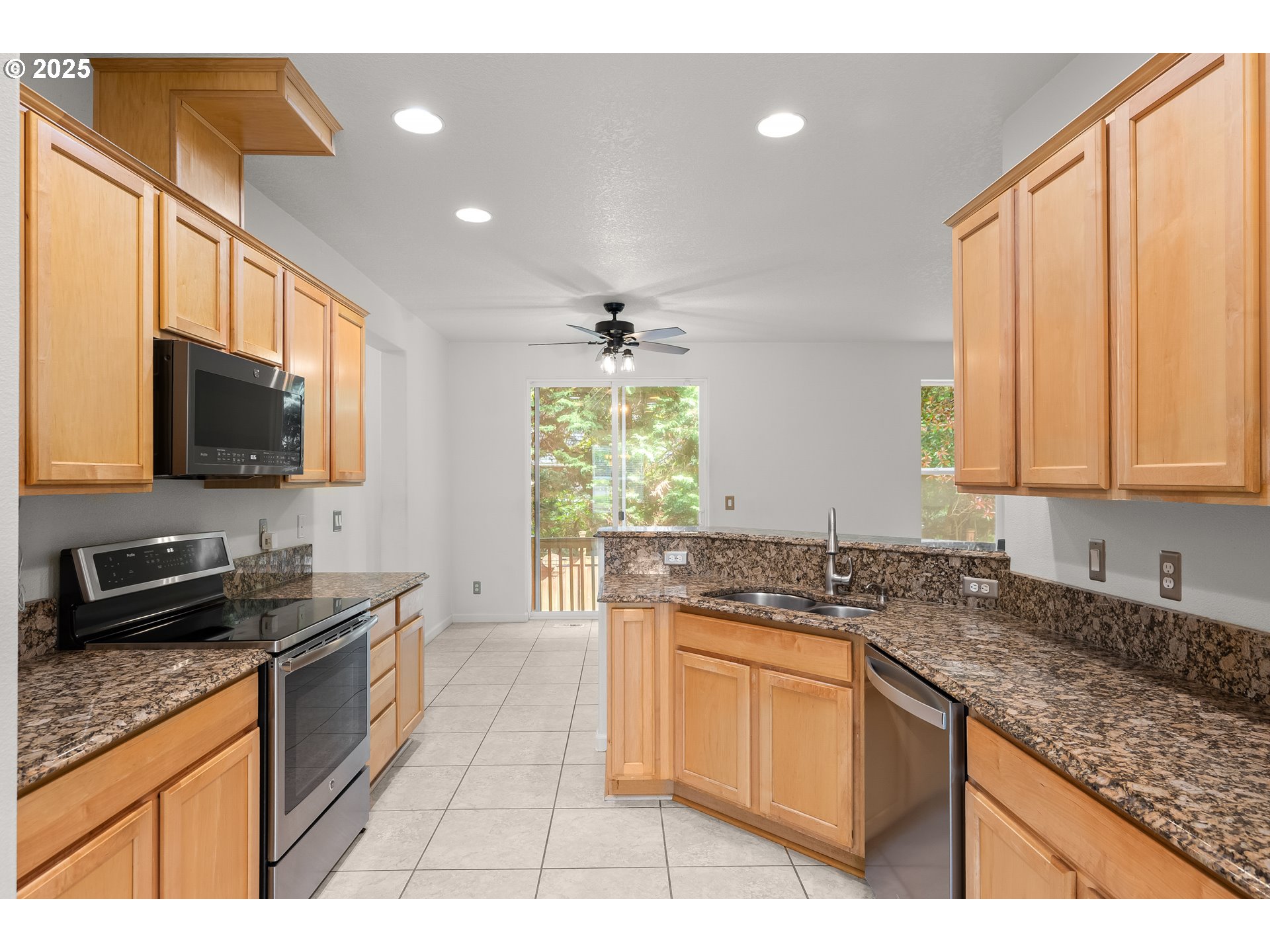 1971 Southwest 19th Terrace Gresham, OR 97080 - Photo 4 of 31 a kitchen with a sink stove and microwave