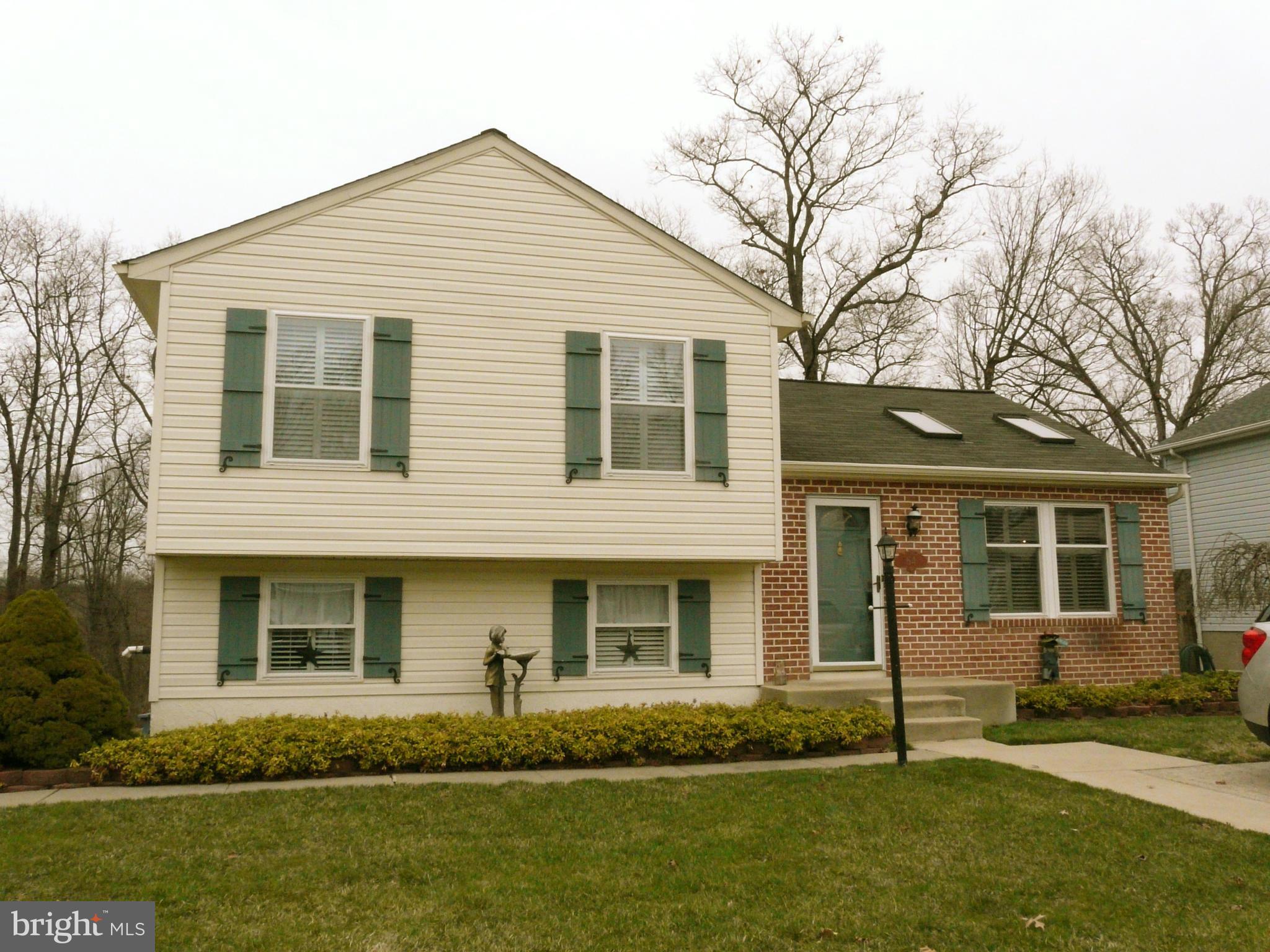 64 Yew Road Baltimore, MD 21221 - Photo 1 of 30 a front view of a house with a garden