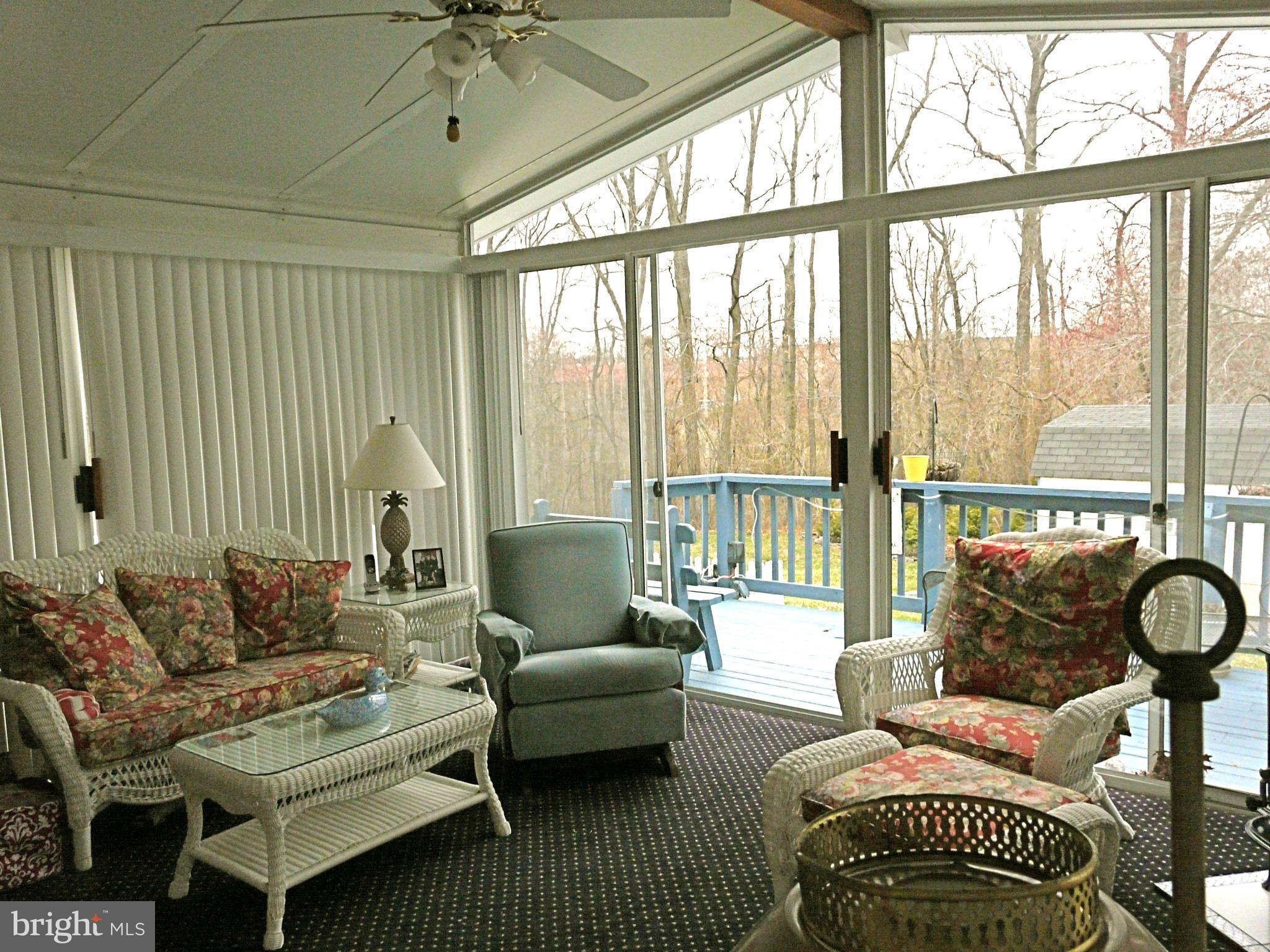 64 Yew Road Baltimore, MD 21221 - Photo 13 of 30 a living room with furniture and a large window
