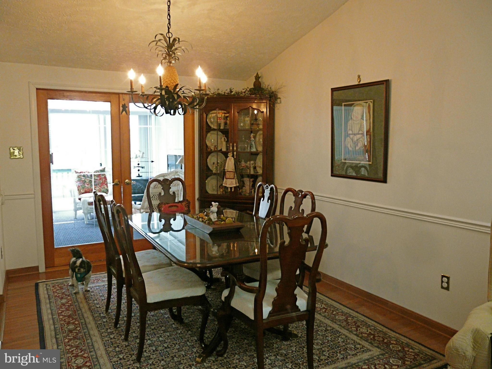 64 Yew Road Baltimore, MD 21221 - Photo 16 of 30 a view of a dining room with furniture and window