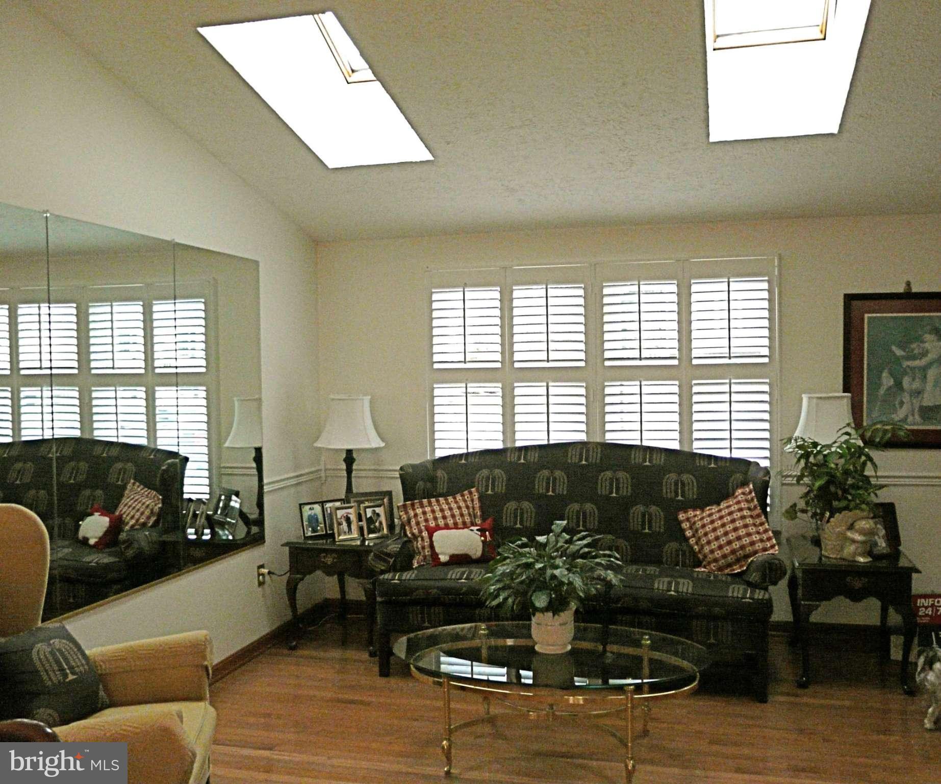 64 Yew Road Baltimore, MD 21221 - Photo 20 of 30 a living room with furniture and a large window