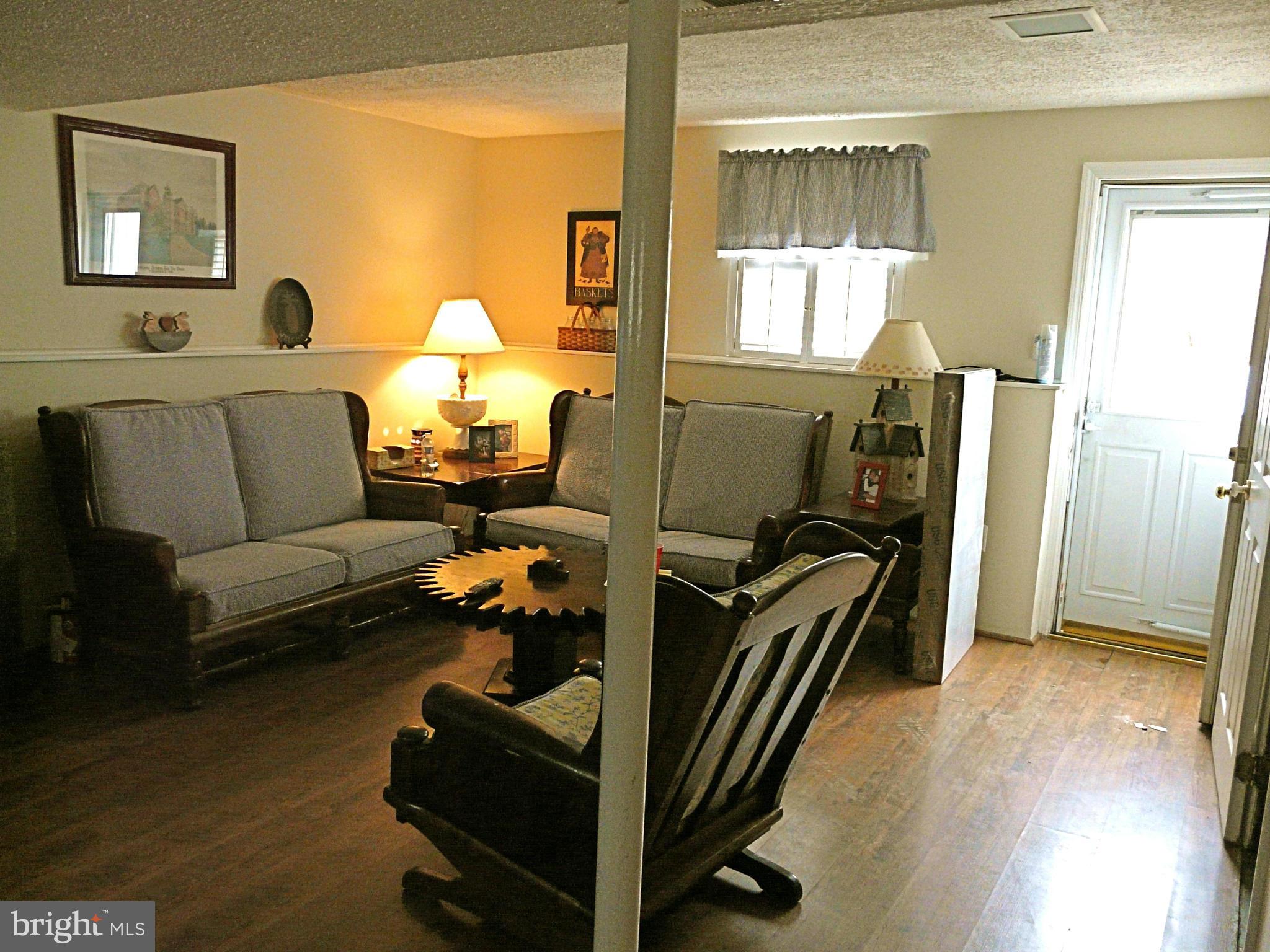 64 Yew Road Baltimore, MD 21221 - Photo 28 of 30 a bedroom with furniture and a window