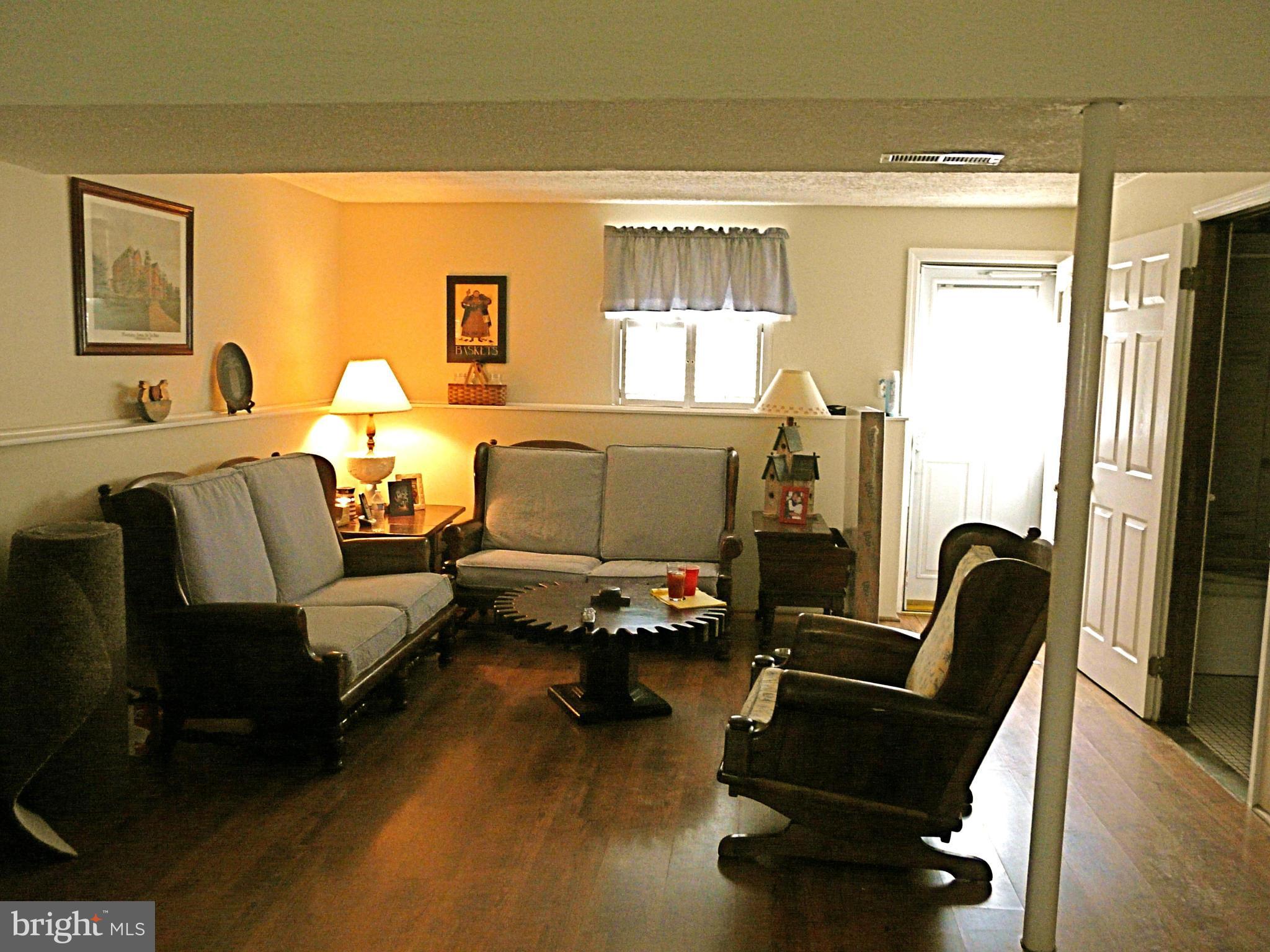 64 Yew Road Baltimore, MD 21221 - Photo 29 of 30 a living room with furniture and a window