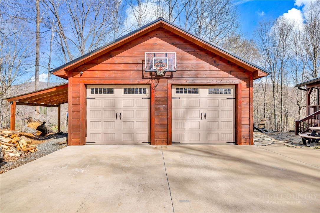 7994 3 Top Road Todd, NC 28684 - Photo 41 of 50 a view of a house with a outdoor space
