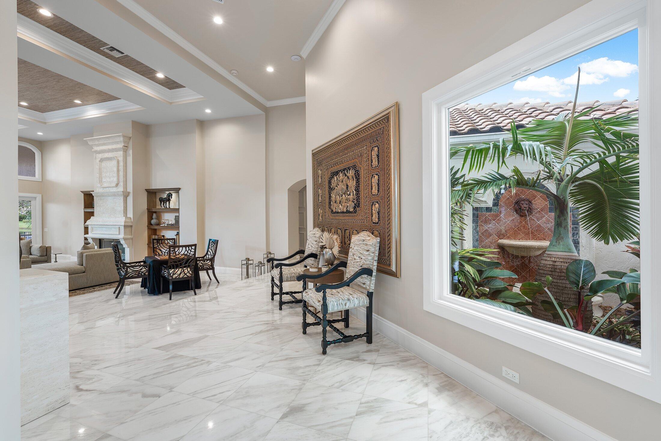 17153 Ericarose Court Boca Raton, FL 33496 - Photo 24 of 133 Foyer to Living Room