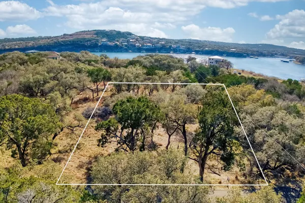 a view of a city with mountains in the background