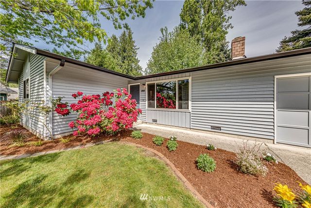 a view front of house with flowers