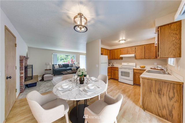 a view of a dining room with furniture