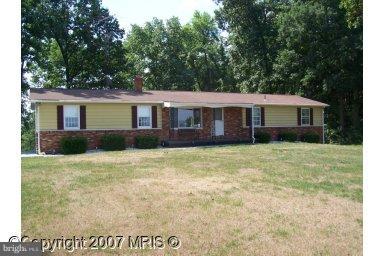 14513 Bollinger Road Rocky Ridge, MD 21778 - Photo 1 of 1 a front view of a house with a yard