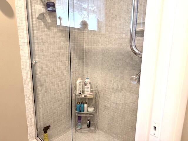 1206 South Lakes End Drive, Unit D Fort Pierce, FL 34982 - Photo 18 of 21 a bathroom with a shower