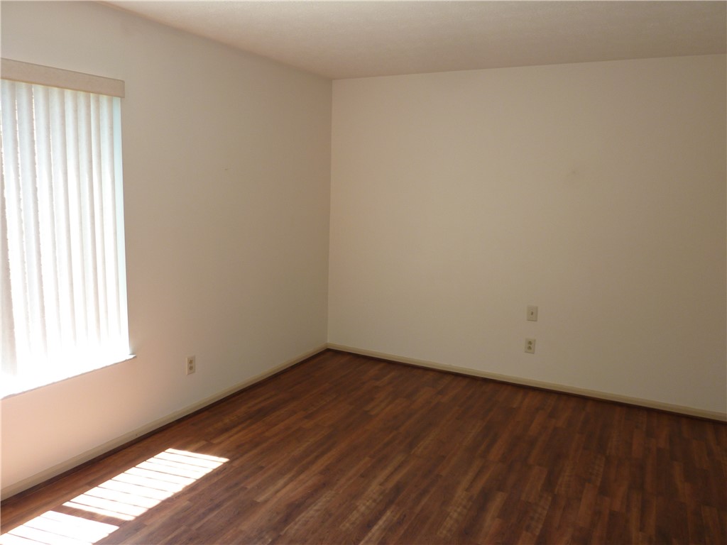 1345 Tattersall Road, Unit 64 Dayton, OH 45459 - Photo 11 of 25 This bright space features rich wood flooring, ideal for a comfortable and inviting atmosphere.
