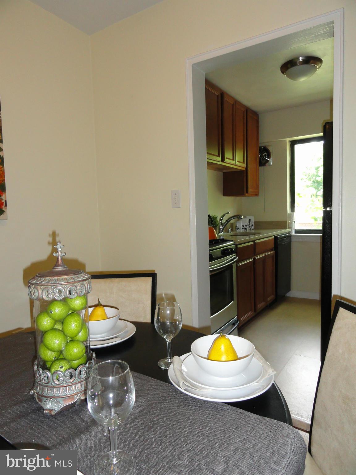 3901 Tunlaw Road Northwest, Unit 701 Washington, DC 20007 - Photo 19 of 29 Dining Room: View of Kitchen