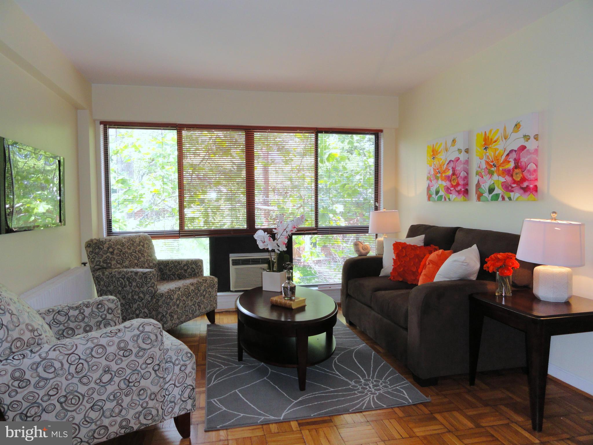 3901 Tunlaw Road Northwest, Unit 701 Washington, DC 20007 - Photo 25 of 29 Living Room: Living in the Trees