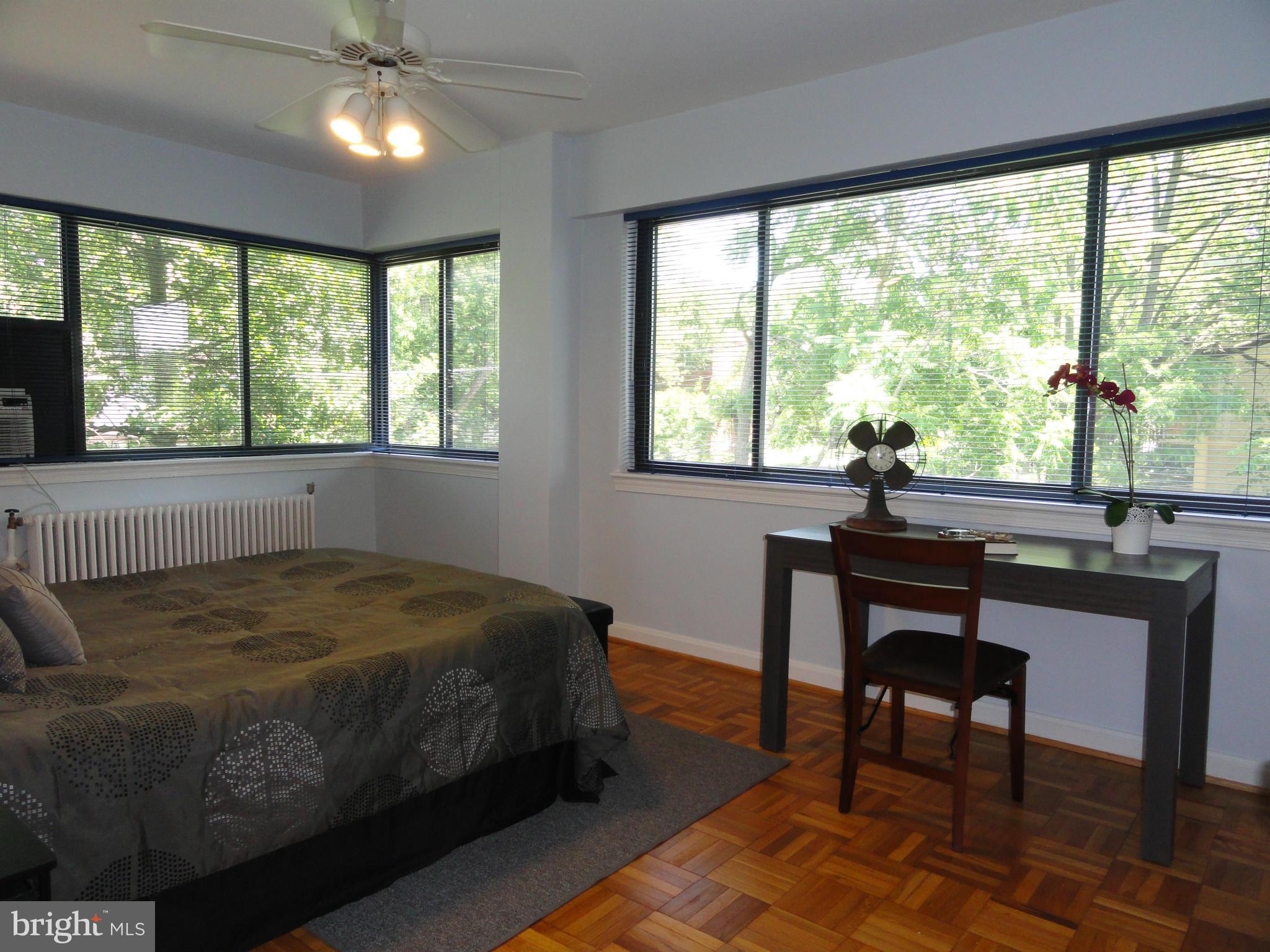 3901 Tunlaw Road Northwest, Unit 701 Washington, DC 20007 - Photo 6 of 29 Master bedroom: two exposures