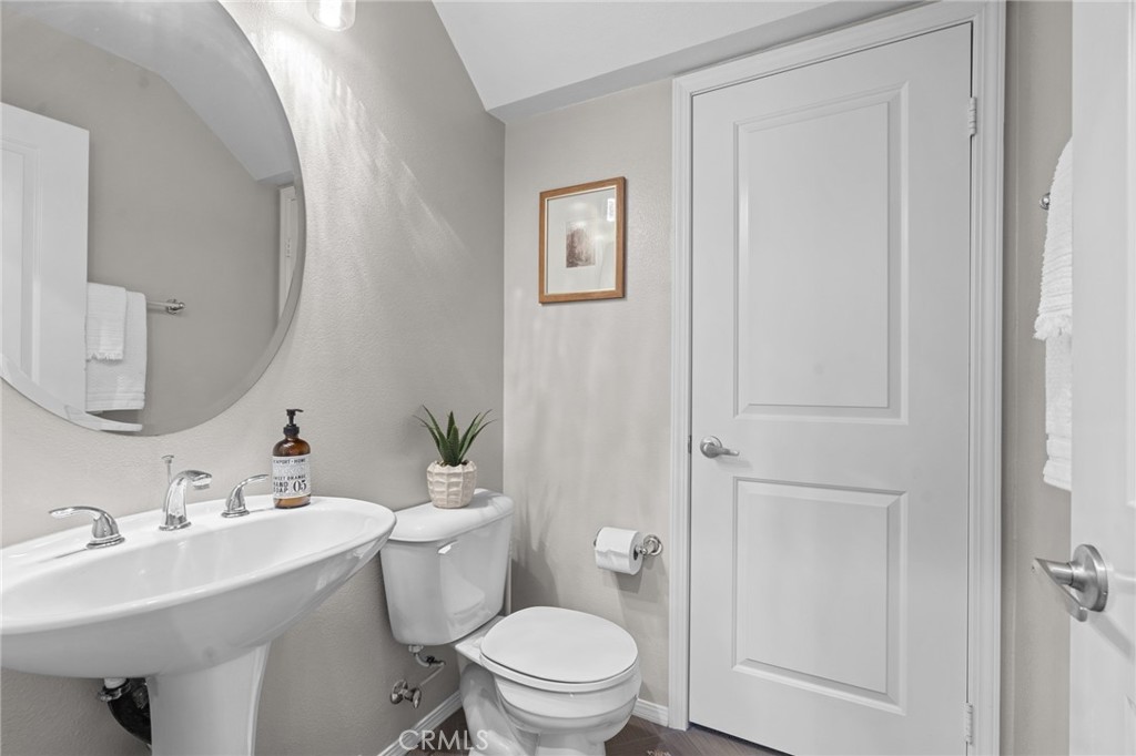 5321 Ocean, Unit 101 Hawthorne, CA 90250 - Photo 11 of 36 a bathroom with a sink toilet and a mirror