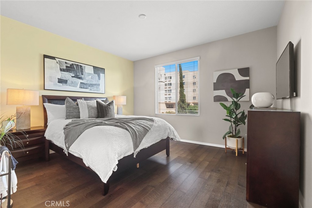 5321 Ocean, Unit 101 Hawthorne, CA 90250 - Photo 12 of 36 a bedroom with bed and wooden floor