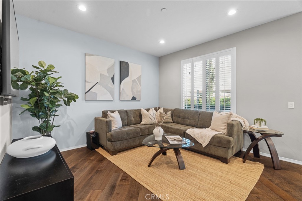 5321 Ocean, Unit 101 Hawthorne, CA 90250 - Photo 2 of 36 a living room with furniture and a potted plant