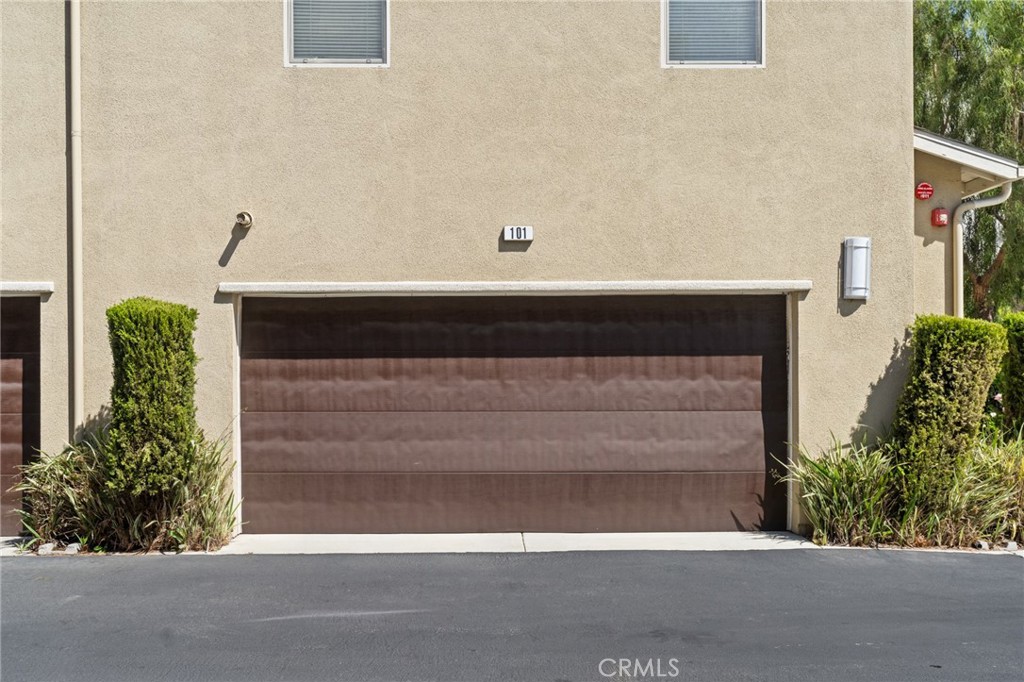 5321 Ocean, Unit 101 Hawthorne, CA 90250 - Photo 22 of 36 a front view of a house with a garage