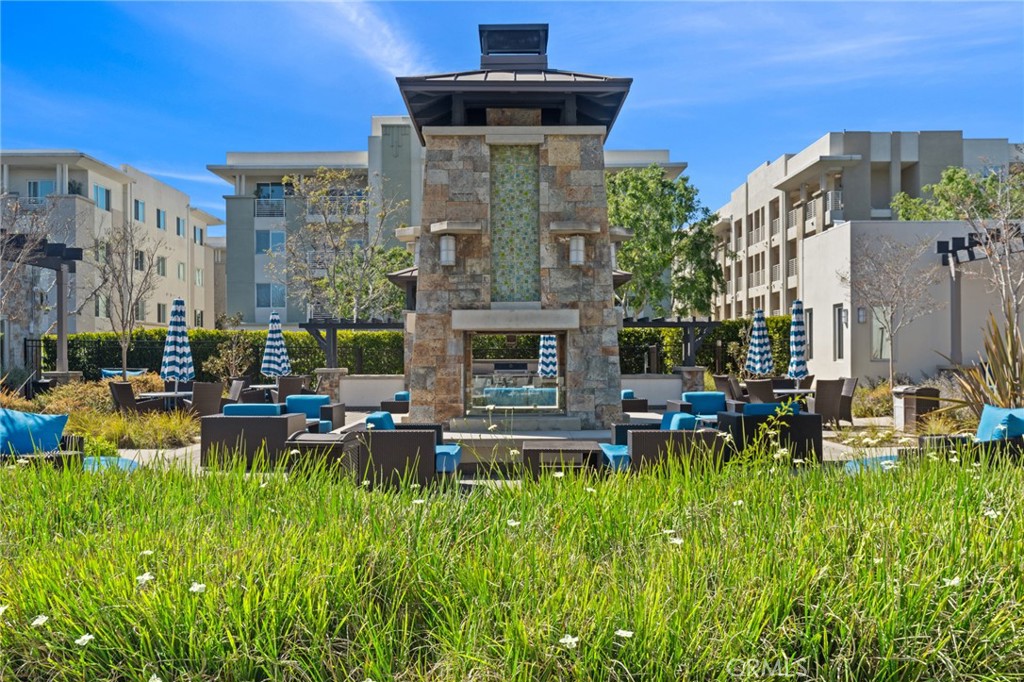 5321 Ocean, Unit 101 Hawthorne, CA 90250 - Photo 27 of 36 a view of a house with a chairs in a patio