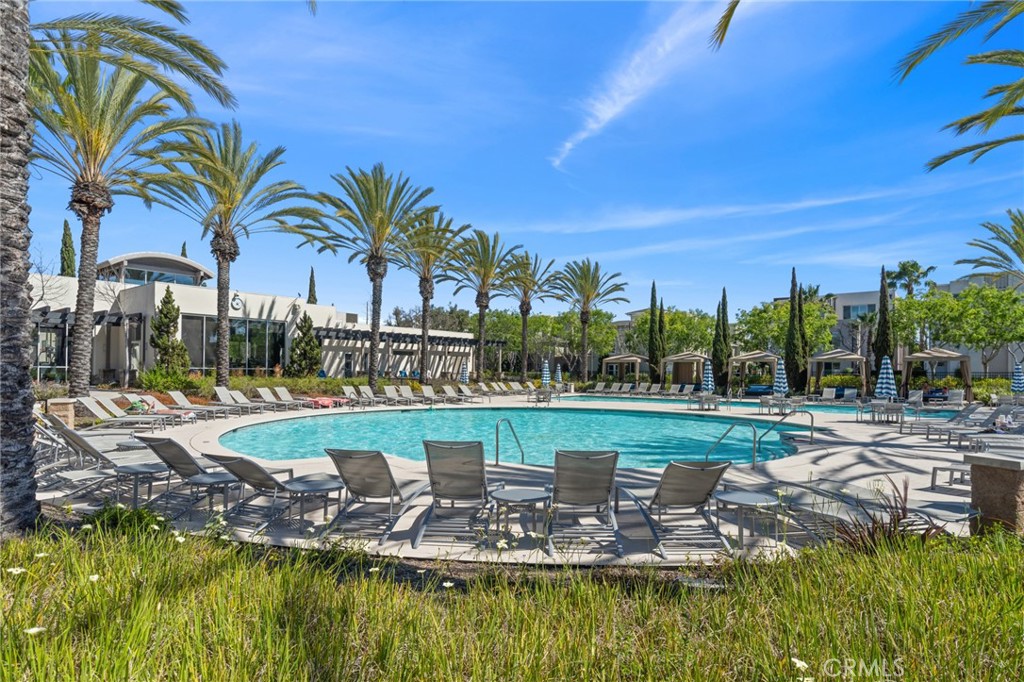 5321 Ocean, Unit 101 Hawthorne, CA 90250 - Photo 28 of 36 a view of a swimming pool with a table and chairs