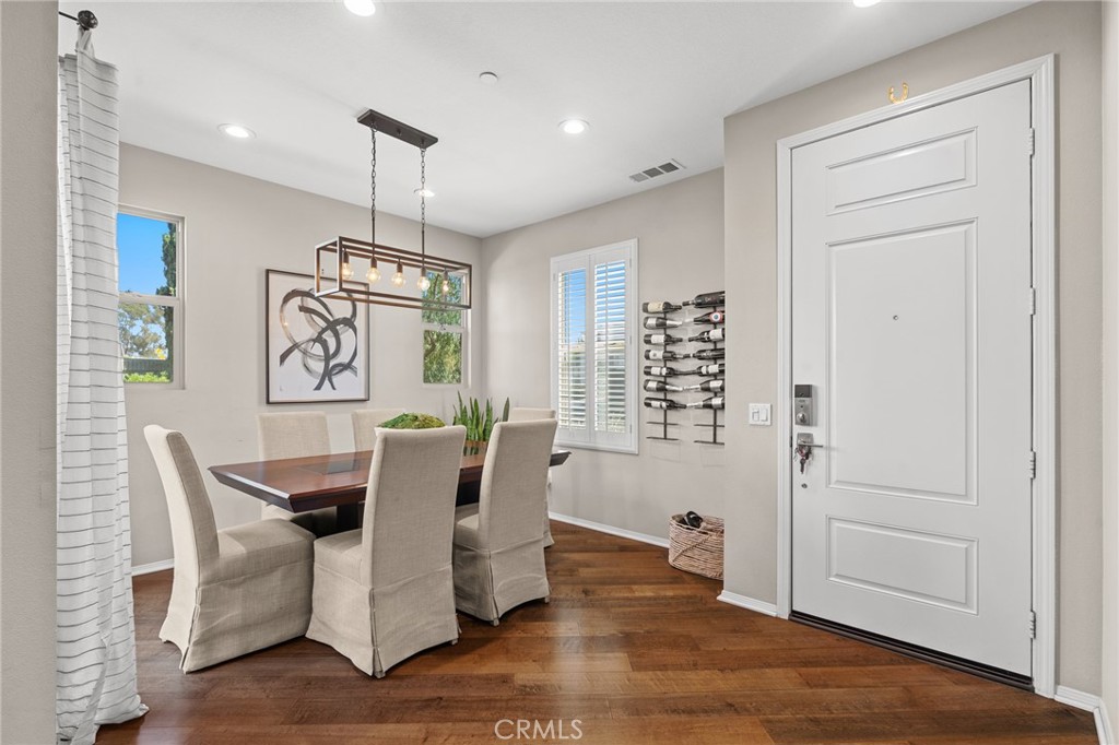 5321 Ocean, Unit 101 Hawthorne, CA 90250 - Photo 4 of 36 a view of a dining room with furniture window and wooden floor