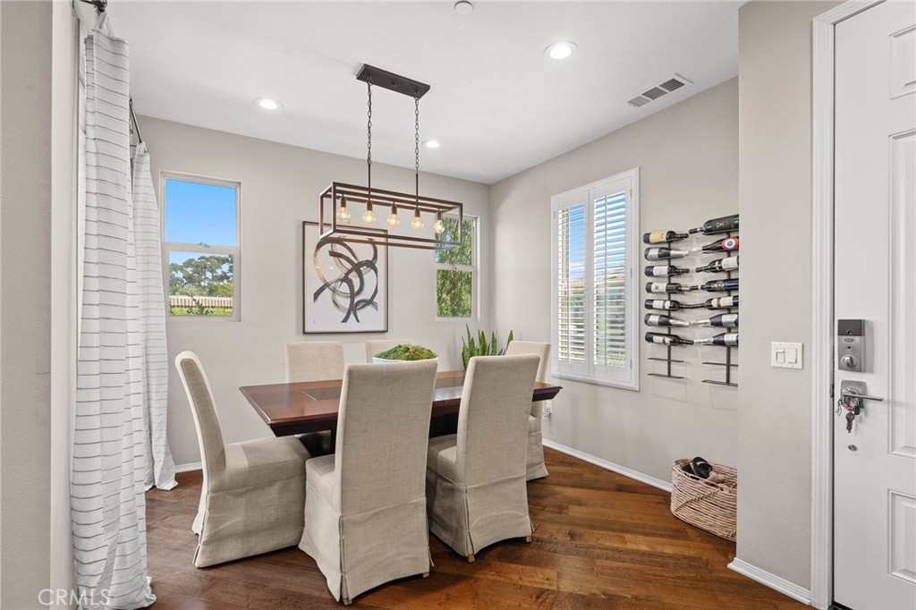 5321 Ocean, Unit 101 Hawthorne, CA 90250 - Photo 5 of 36 a view of a dining room with furniture window and wooden floor