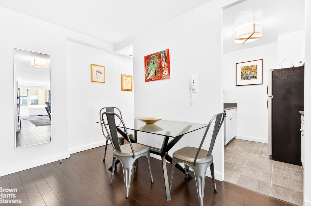 520 East 72nd Street, Unit 3G Manhattan, NY 10021 - Photo 4 of 15 a view of a dining room with furniture and wooden floor