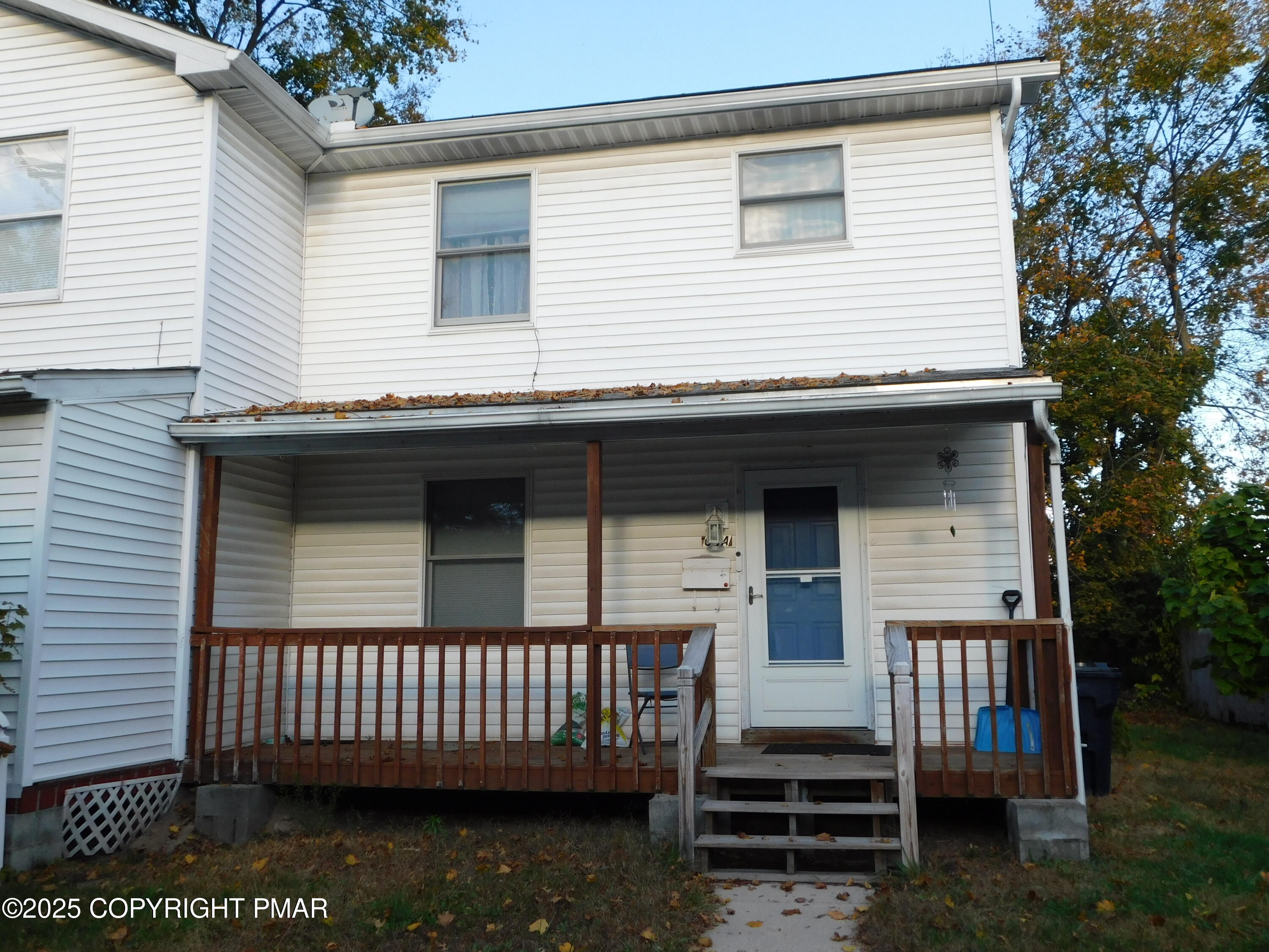 64 North 2nd Street, Unit A Stroudsburg, PA 18360 - Photo 2 of 12 a front view of a house with stairs