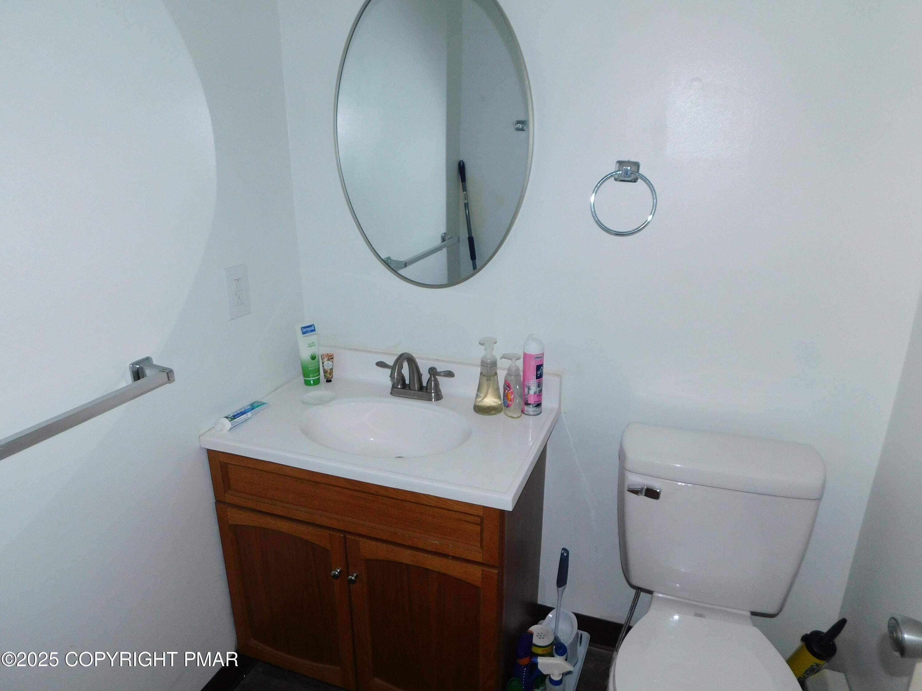 64 North 2nd Street, Unit A Stroudsburg, PA 18360 - Photo 10 of 12 a bathroom with a sink toilet and a mirror