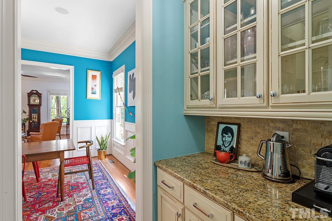 3100 Raymond Street Raleigh, NC 27607 - Photo 12 of 37 a view of a kitchen with furniture and a window