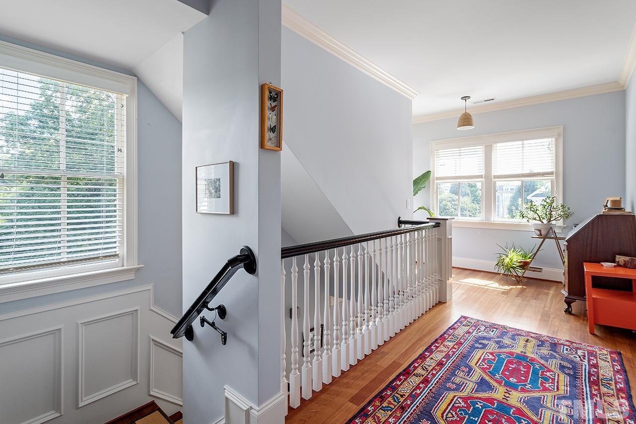 3100 Raymond Street Raleigh, NC 27607 - Photo 18 of 37 a bedroom with furniture and a window