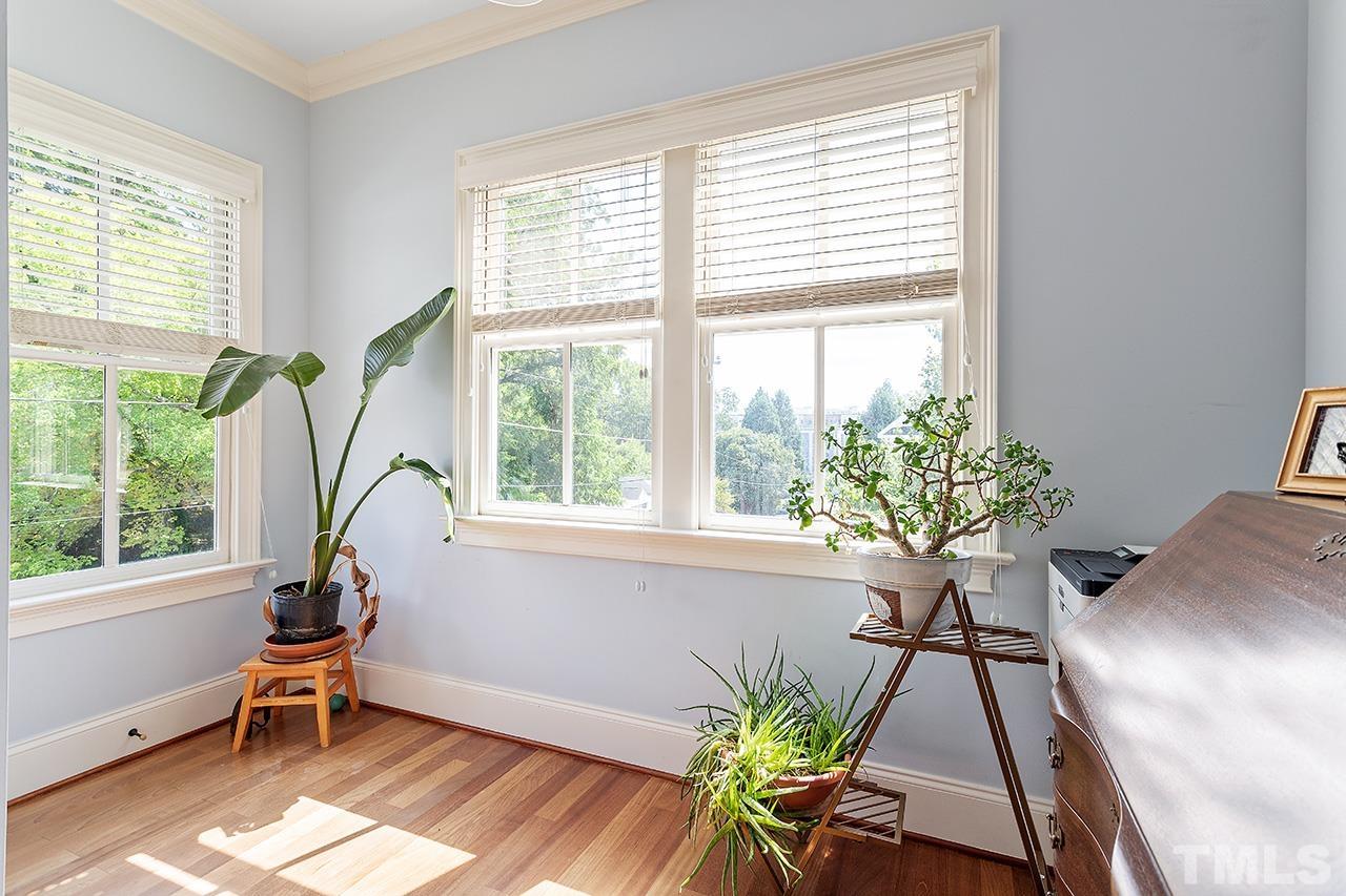 3100 Raymond Street Raleigh, NC 27607 - Photo 19 of 37 a living room filled with furniture and a potted plant