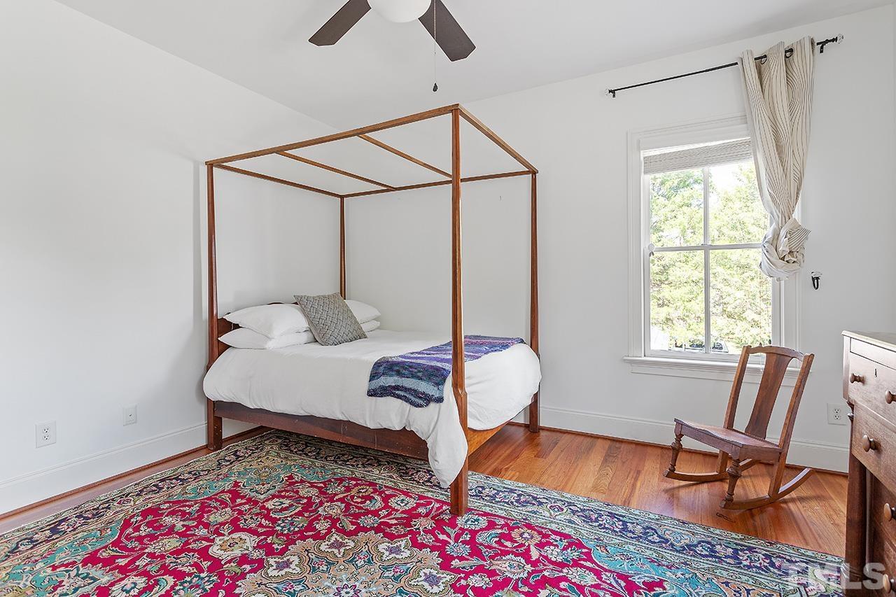 3100 Raymond Street Raleigh, NC 27607 - Photo 25 of 37 a bedroom with furniture and a window
